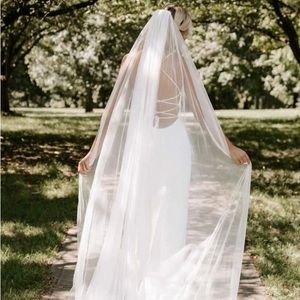 Grace veil. Never been worn. Will need steamed because it came in a bag.